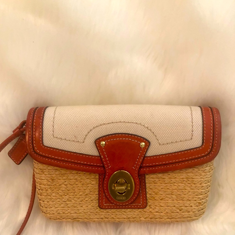 Coach beige wristlet with orange accents